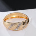 Arc-shaped Stone Inlaid Gold Bracelet